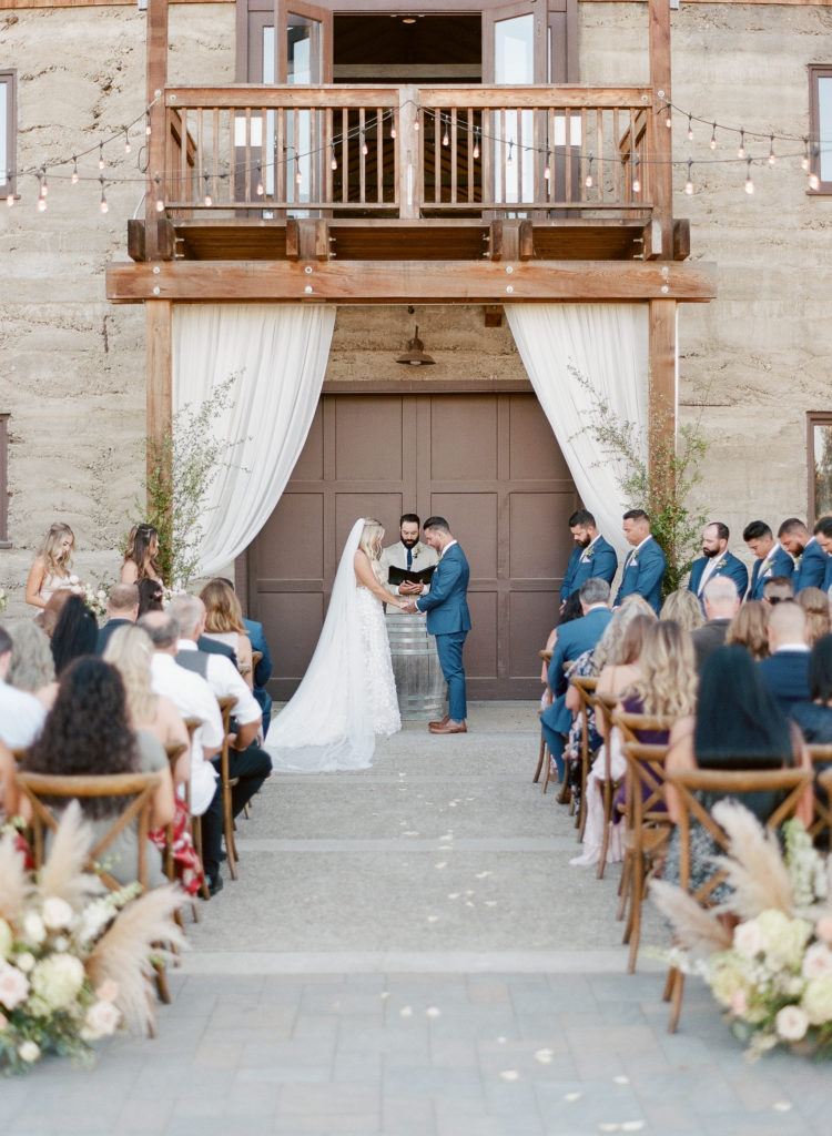 Outdoor wedding ceremony at Murrieta's Well Bay Area venue