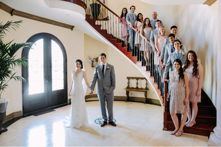 prom style wedding party photo with bride and groom