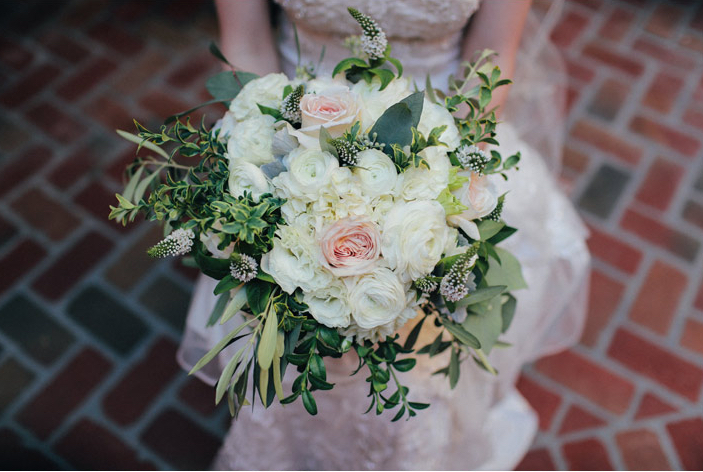 bridal bouquet in peach and blush peonies, dahlias and white ranunculus