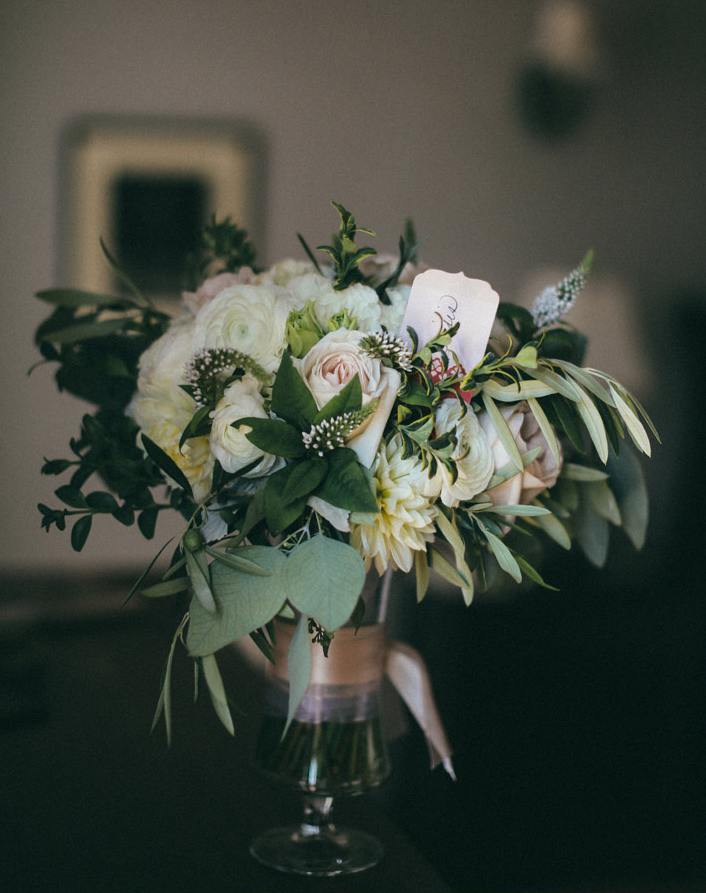 bridal bouquet in peach and blush peonies, dahlias and white ranunculus