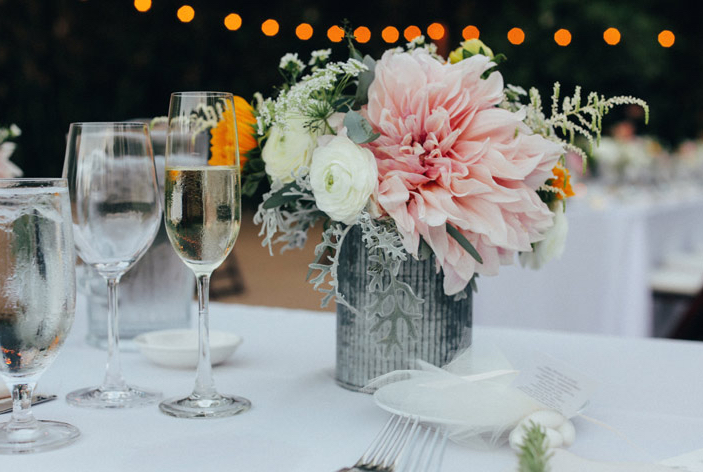 wedding centerpiece, large pink dahlia, white ranunculus 