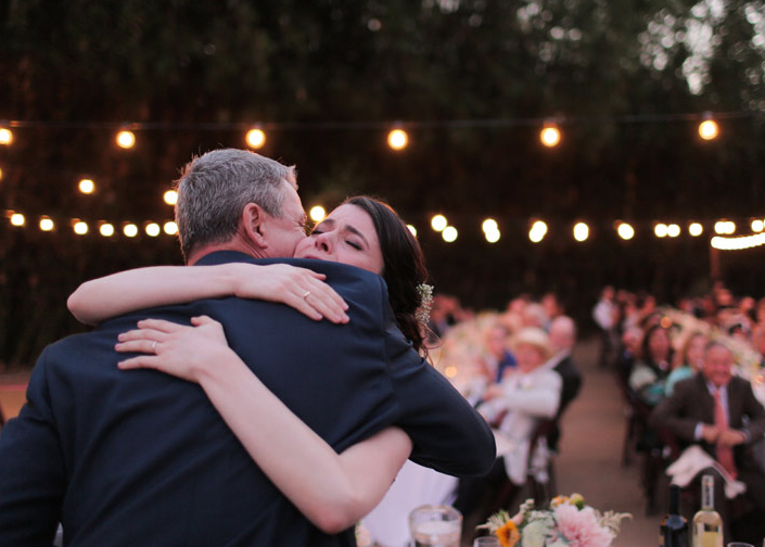 bride emotionally hugging father